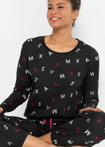 Festive pajama suit with a gift bag